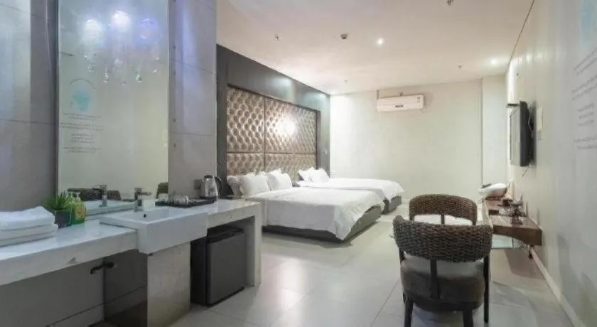 Bed in Qingdao Hengbo Hotel