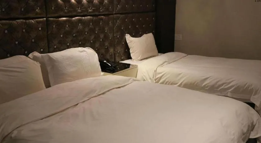 Bed in Qingdao Hengbo Hotel