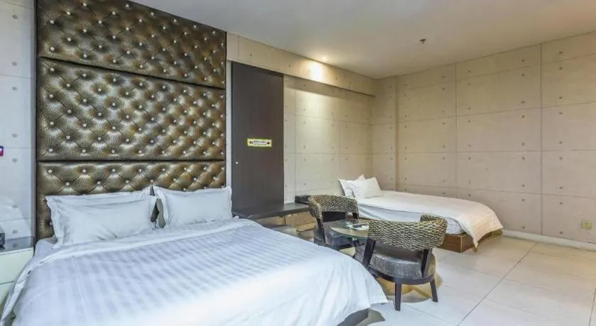 Bed in Qingdao Hengbo Hotel