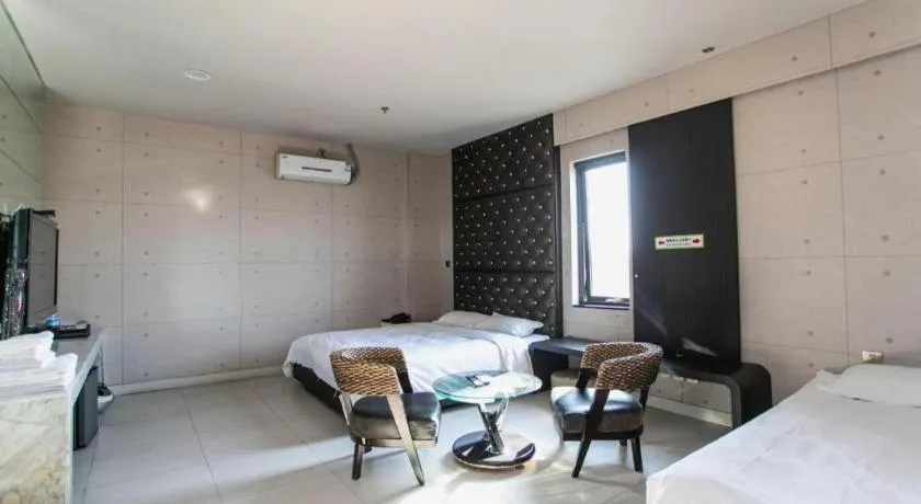 Bed in Qingdao Hengbo Hotel