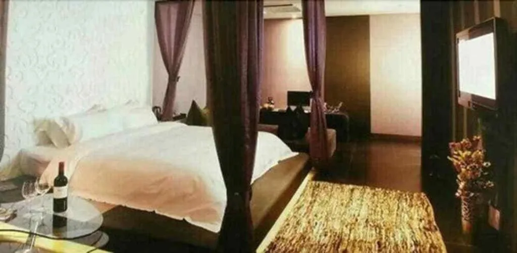 Bed in Qingdao Hengbo Hotel