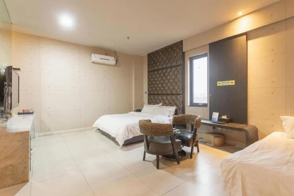 Bed in Qingdao Hengbo Hotel