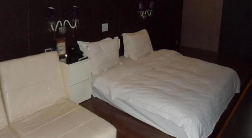 Bed in Qingdao Hengbo Hotel