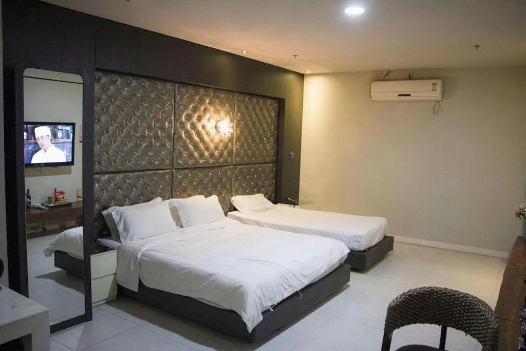 Bed in Qingdao Hengbo Hotel