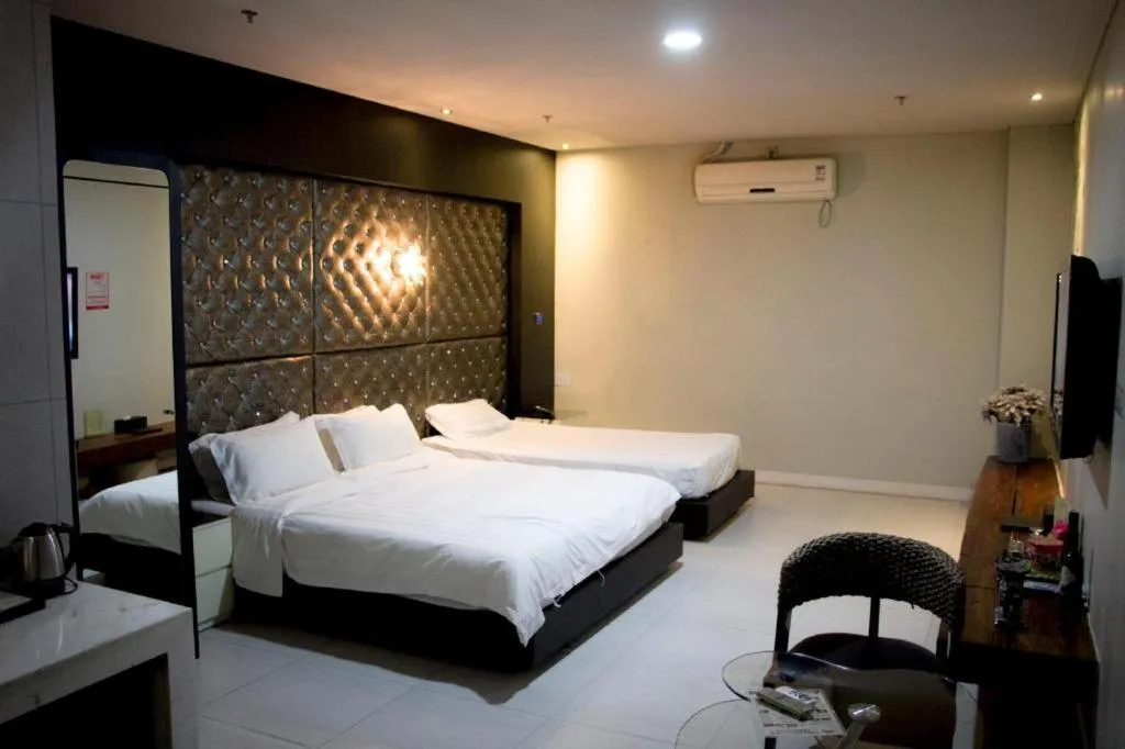 Bed in Qingdao Hengbo Hotel