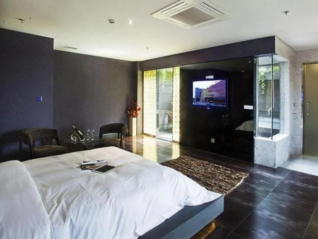 Bed in Qingdao Hengbo Hotel