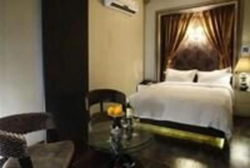 Bed in Qingdao Hengbo Hotel