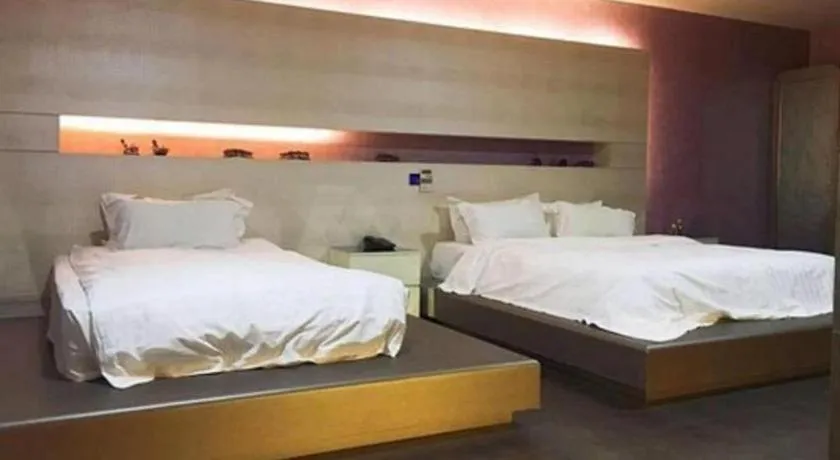 Bed in Qingdao Hengbo Hotel