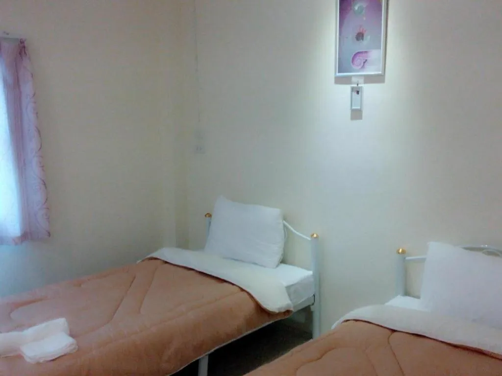 Bed in Green Home Resort