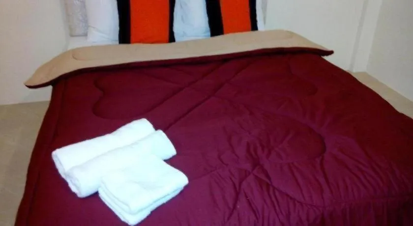 Bed in Green Home Resort