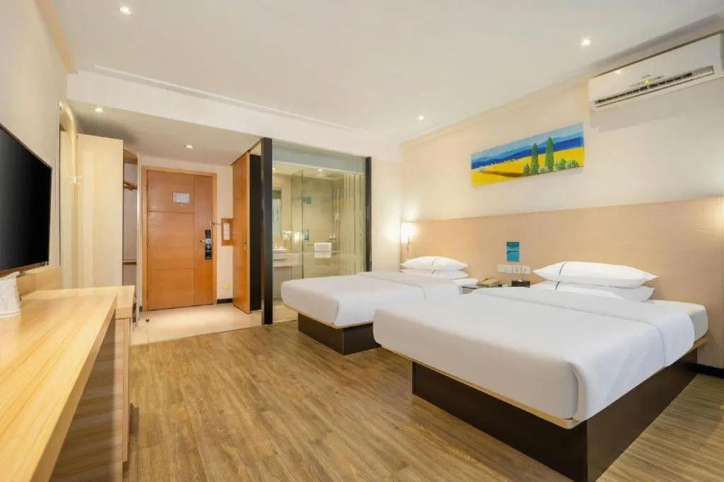 Bed in City Comfort Inn Wuzhou Wangcheng Square