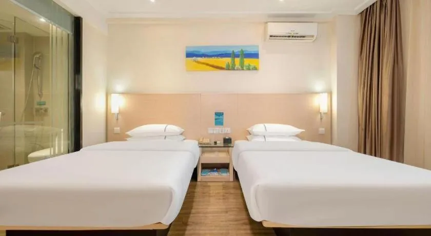 Bed in City Comfort Inn Wuzhou Wangcheng Square