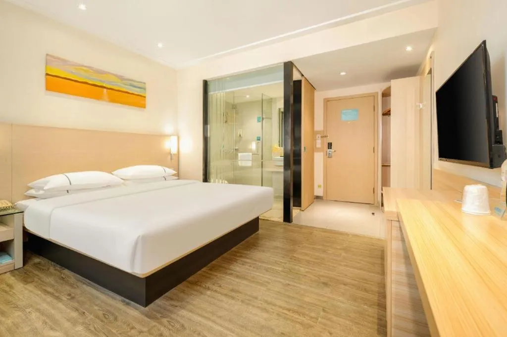 Bed in City Comfort Inn Wuzhou Wangcheng Square