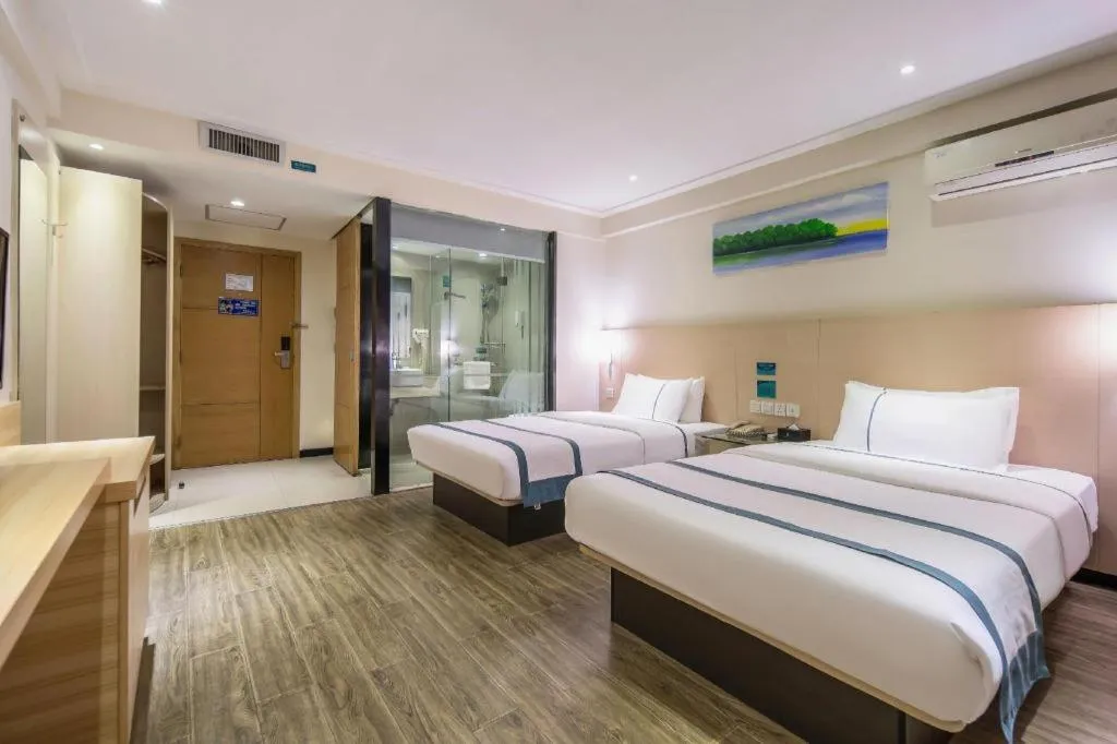 Bed in City Comfort Inn Wuzhou Wangcheng Square