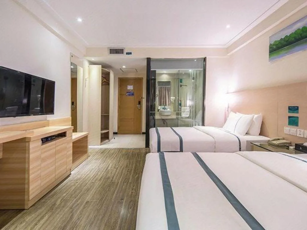 Bed in City Comfort Inn Wuzhou Wangcheng Square