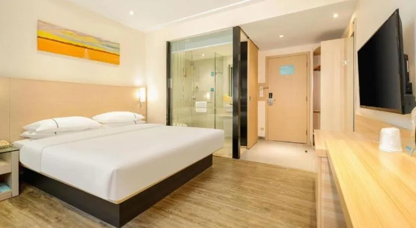 Bed in City Comfort Inn Wuzhou Wangcheng Square