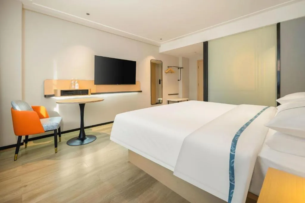 Bed in City Comfort Inn Wuzhou Wangcheng Square