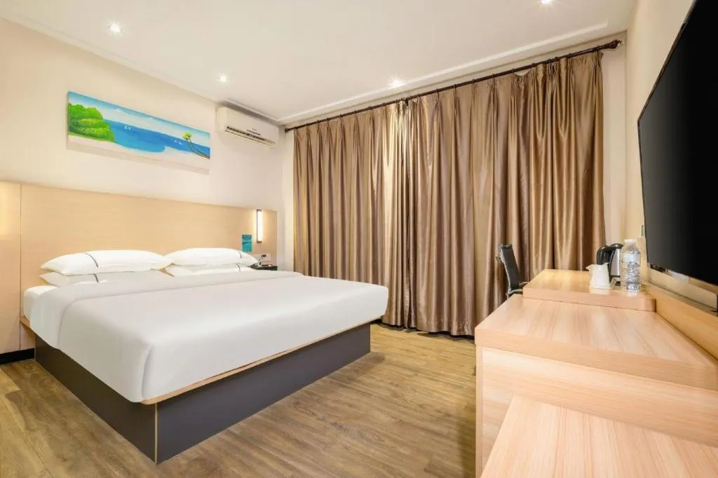 Bed in City Comfort Inn Wuzhou Wangcheng Square