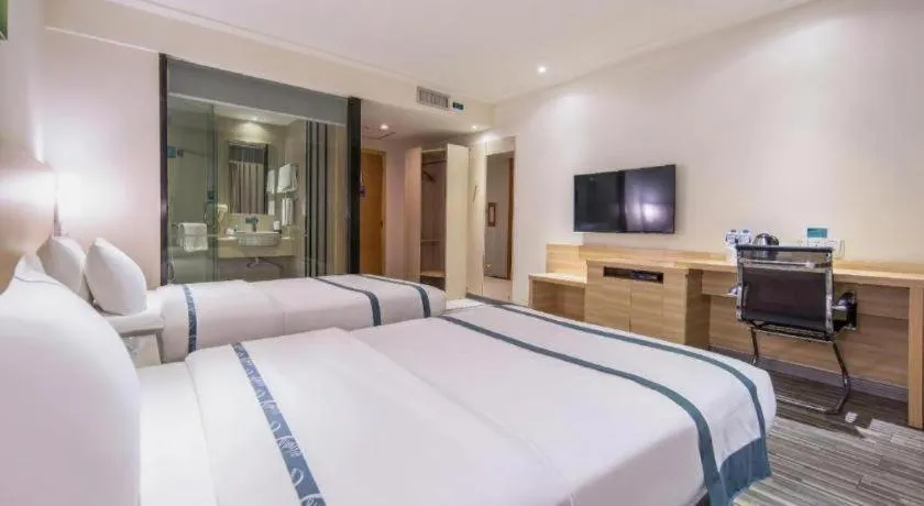 Bed in City Comfort Inn Wuzhou Wangcheng Square