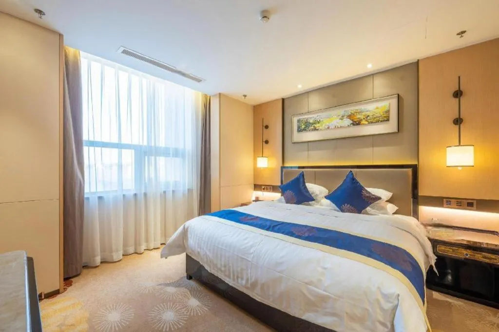 Bed in Qingshan Hotel Baotou