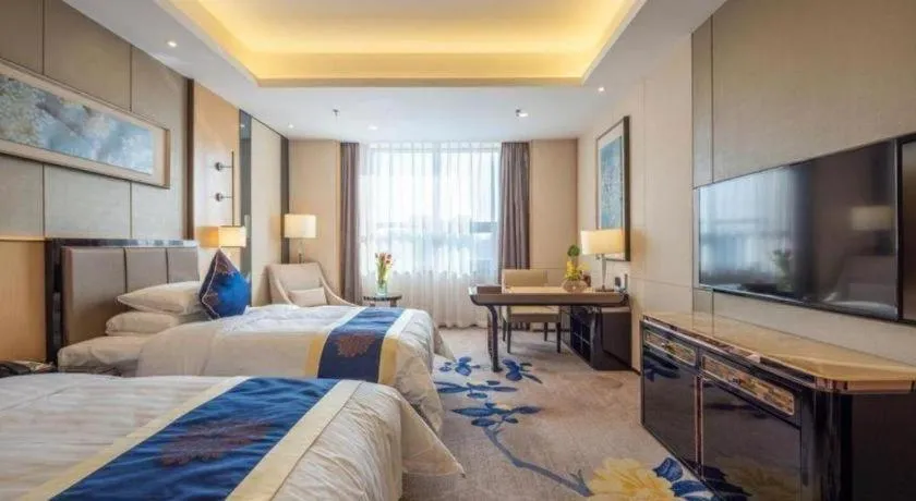 Bed in Qingshan Hotel Baotou