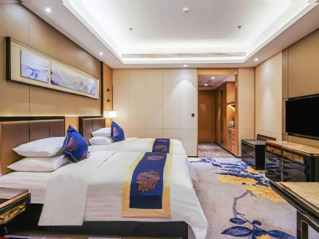 Bed in Qingshan Hotel Baotou