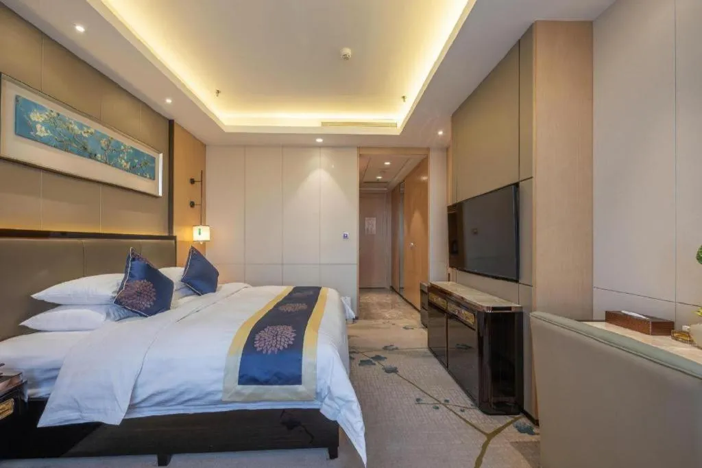 Bed in Qingshan Hotel Baotou