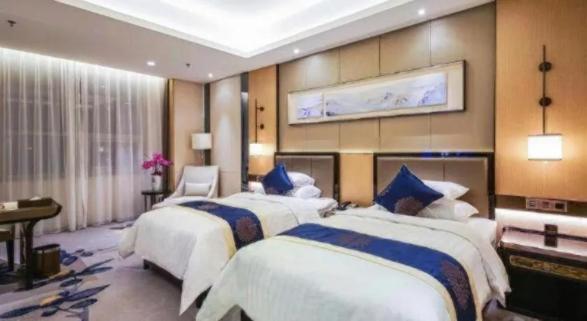 Bed in Qingshan Hotel Baotou