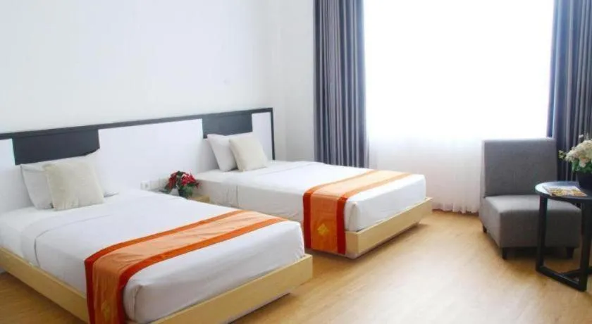 Bed in Buana Lestari Hotel