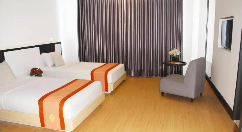 Bed in Buana Lestari Hotel