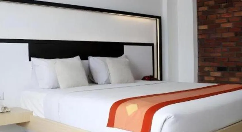 Bed in Buana Lestari Hotel