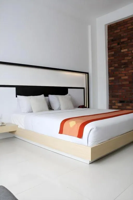 Bed in Buana Lestari Hotel