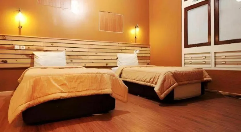 Bed in Zaen Hotel Syariah Solo