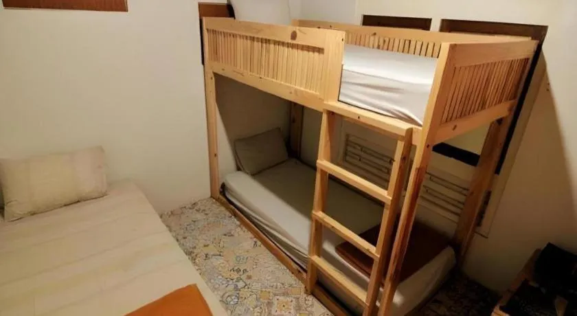 Bed in Zaen Hotel Syariah Solo