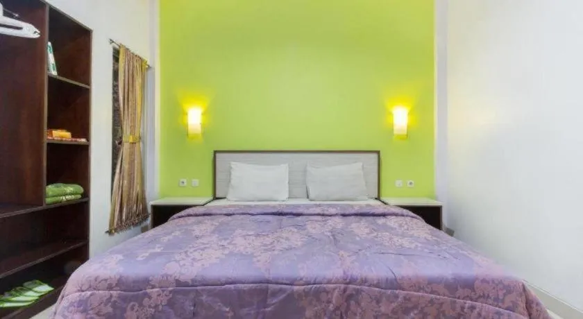 Bed in Zaen Hotel Syariah Solo