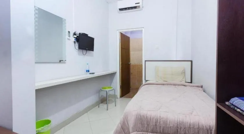 Bed in Zaen Hotel Syariah Solo