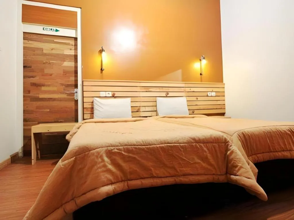 Bed in Zaen Hotel Syariah Solo