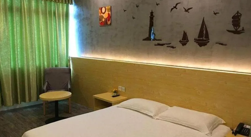Bed in Yi Mi Hotel Shenzhen Longgang Pinghu South China City