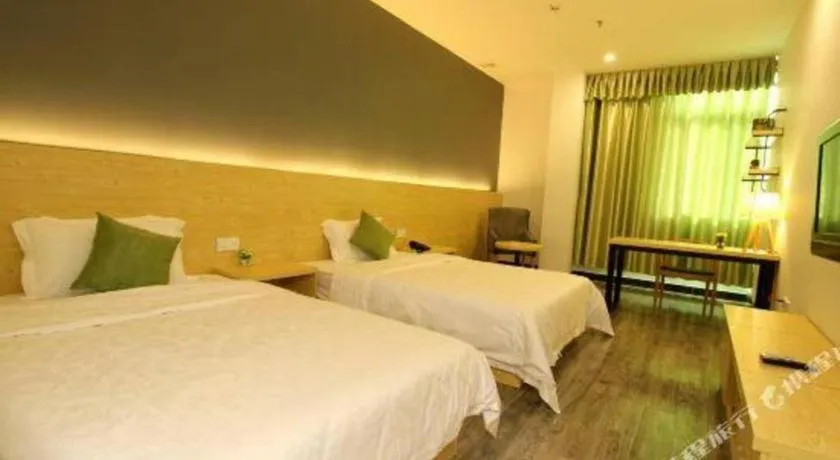 Bed in Yi Mi Hotel Shenzhen Longgang Pinghu South China City