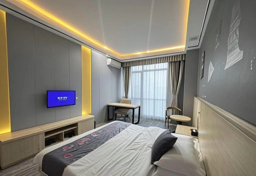 Bed in Yi Mi Hotel Shenzhen Longgang Pinghu South China City