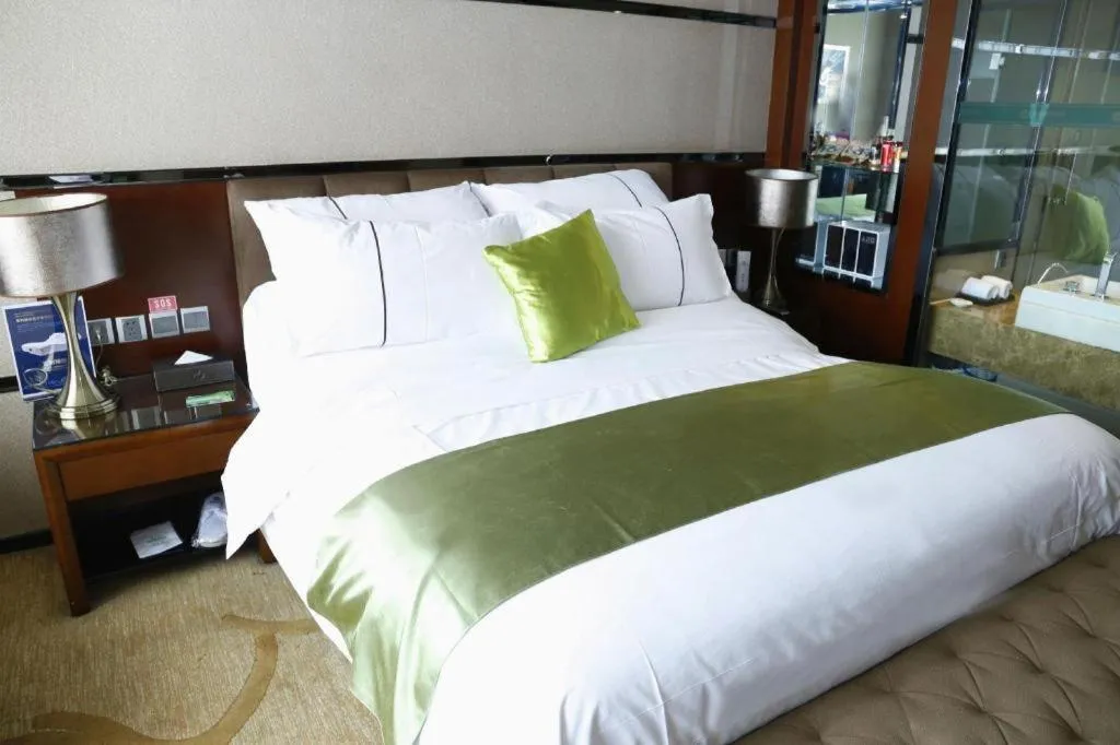 Bed in Liwan International Hotel Chengdu