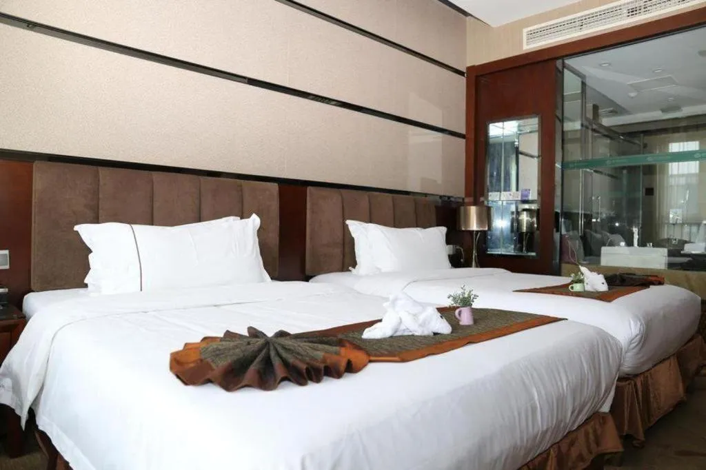 Bed in Liwan International Hotel Chengdu