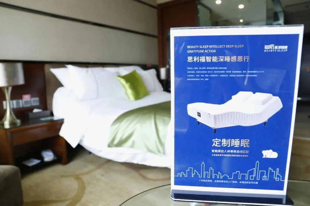 Bed in Liwan International Hotel Chengdu