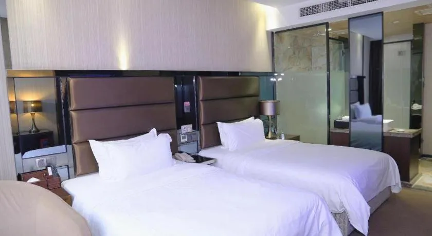 Bed in Liwan International Hotel Chengdu