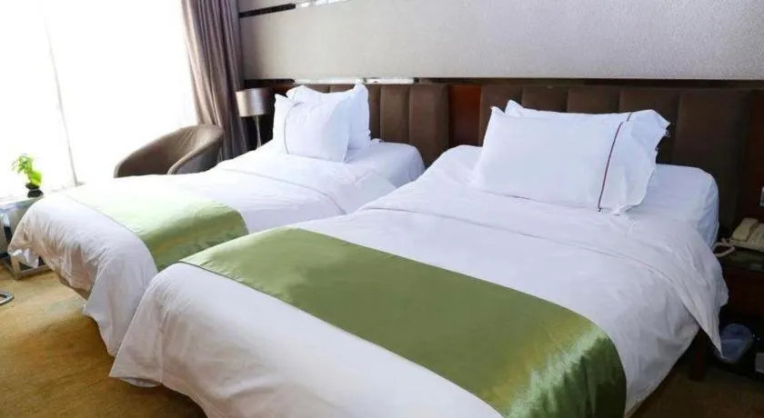Bed in Liwan International Hotel Chengdu
