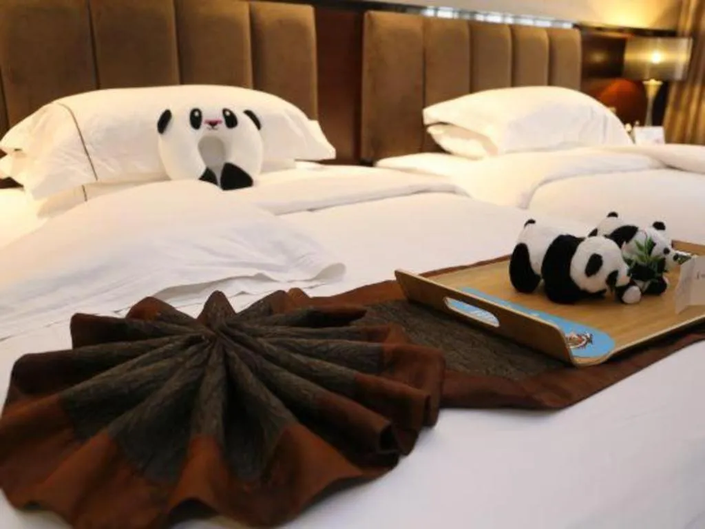 Bed in Liwan International Hotel Chengdu