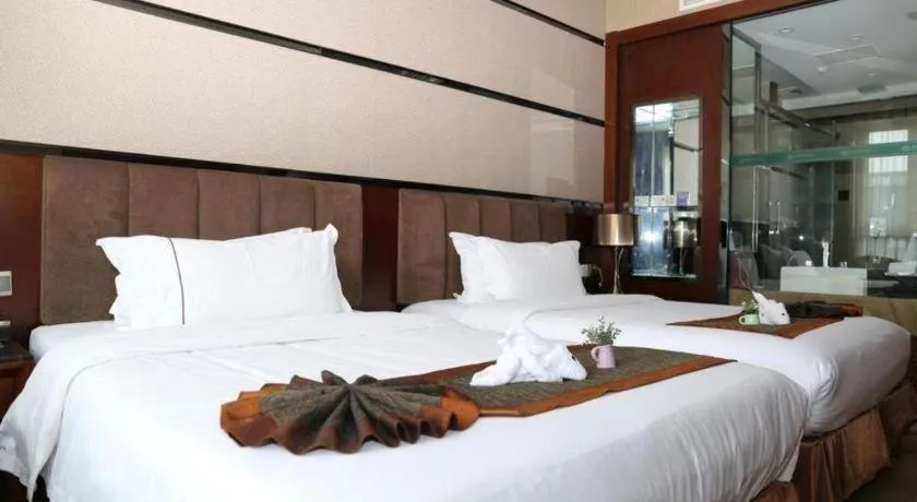 Bed in Liwan International Hotel Chengdu