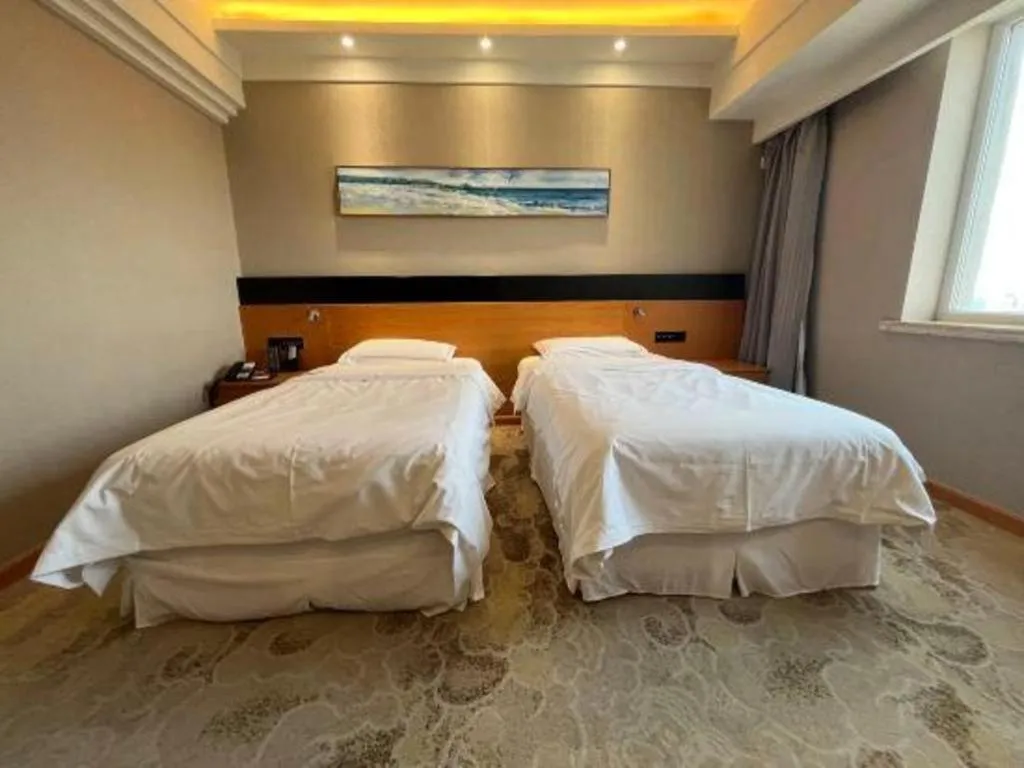 Bed in Yantai Bihai Hotel