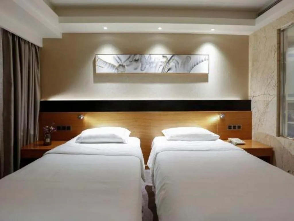 Bed in Yantai Bihai Hotel