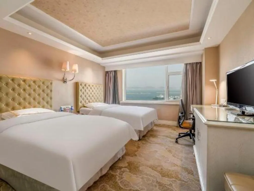 Bed in Yantai Bihai Hotel